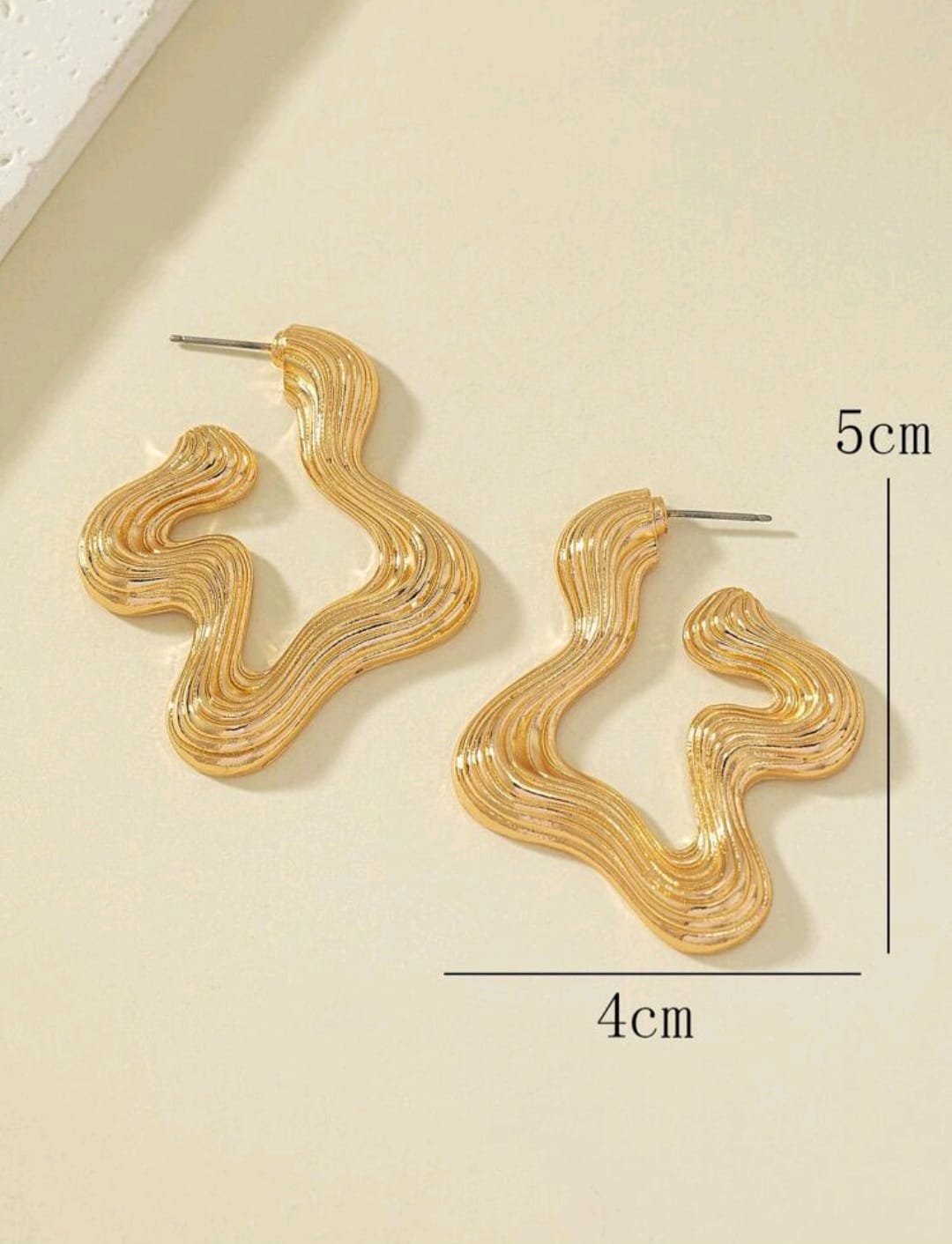 Irregular shaped golden earrings