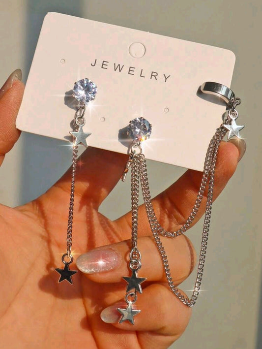 Asymmetrical silver star earrings