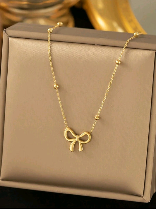Bow golden necklace