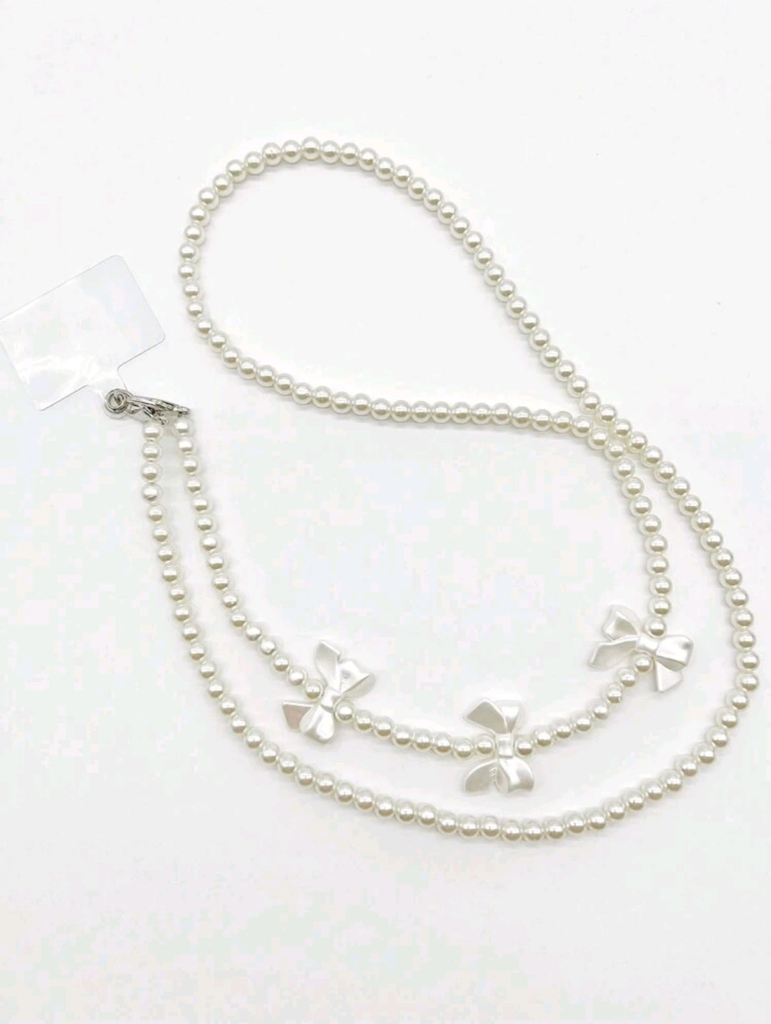 White bow pearl phone lanyard