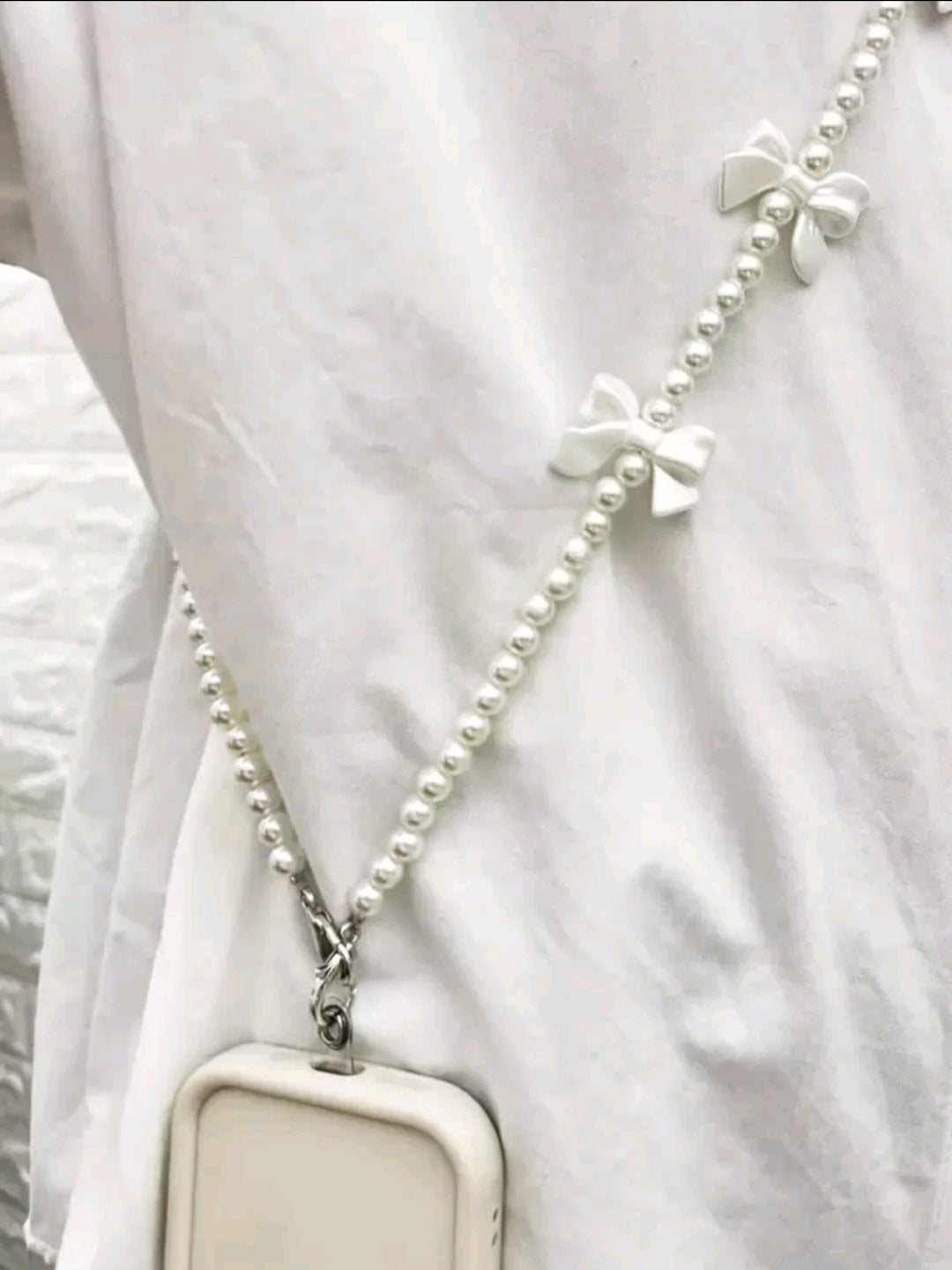 White bow pearl phone lanyard