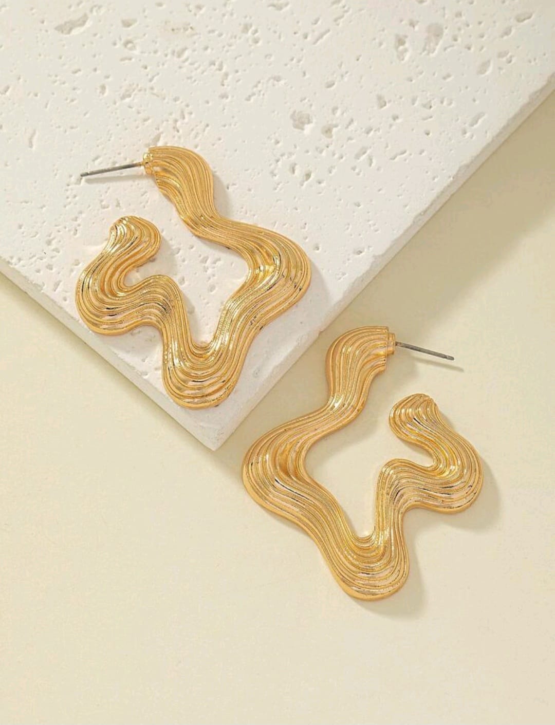 Irregular shaped golden earrings