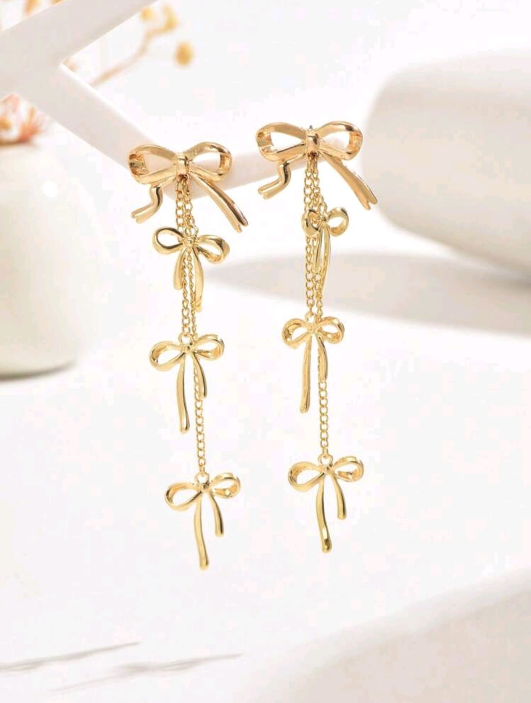 Bow golden earrings
