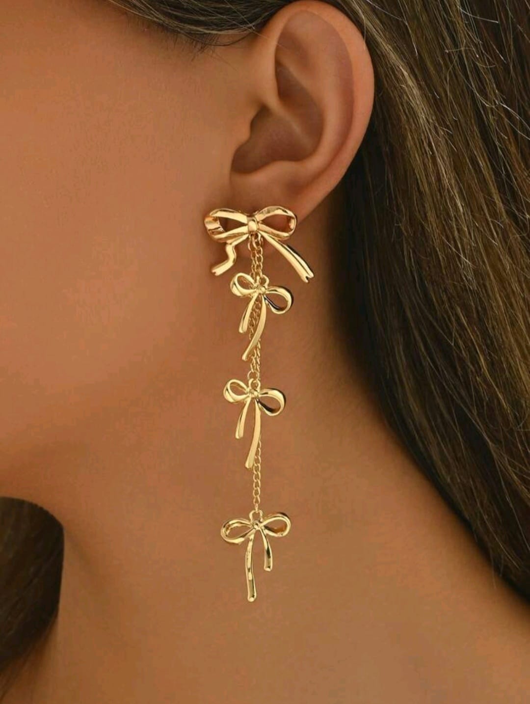 Bow golden earrings