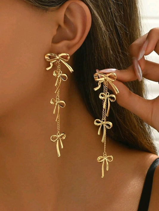 Bow golden earrings