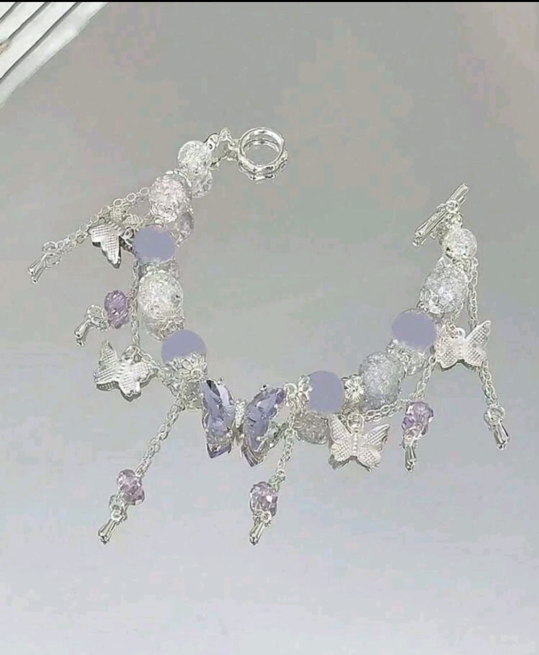 Purple and white beaded bracelet