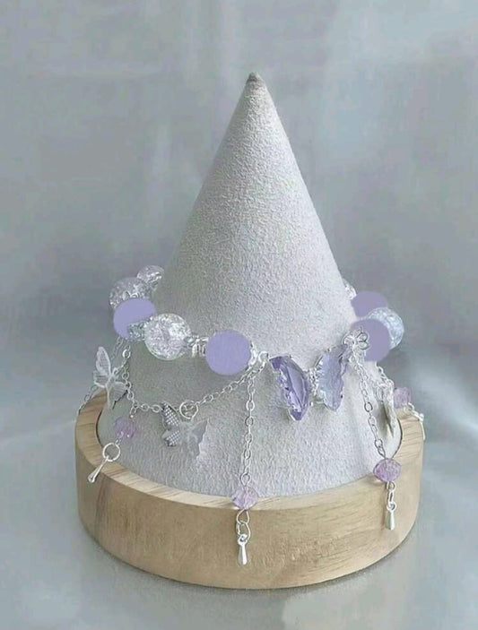 Purple and white beaded bracelet