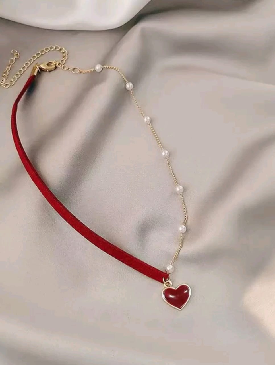 Asymmetrical heart necklace