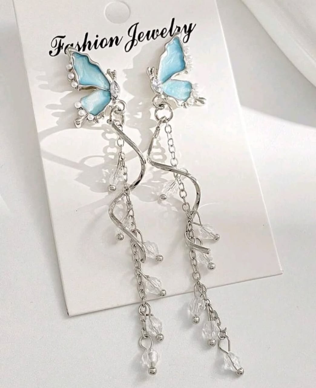 Blue butterfly dangle earrings