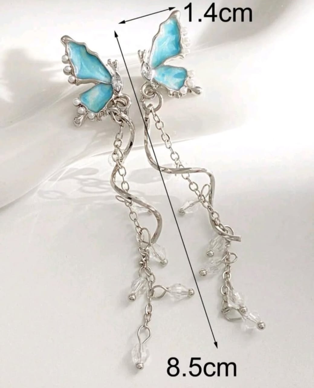 Blue butterfly dangle earrings