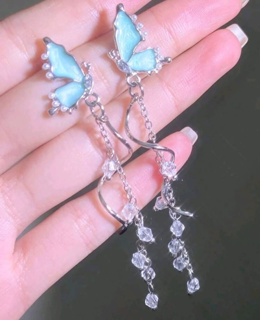 Blue butterfly dangle earrings