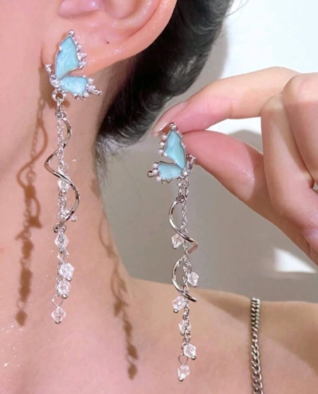 Blue butterfly dangle earrings