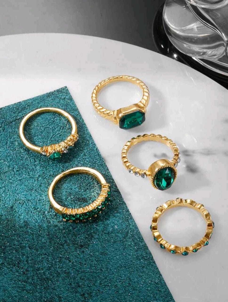 Green stone golden rings set