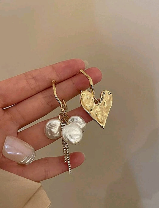 Asymmetrical earrings
