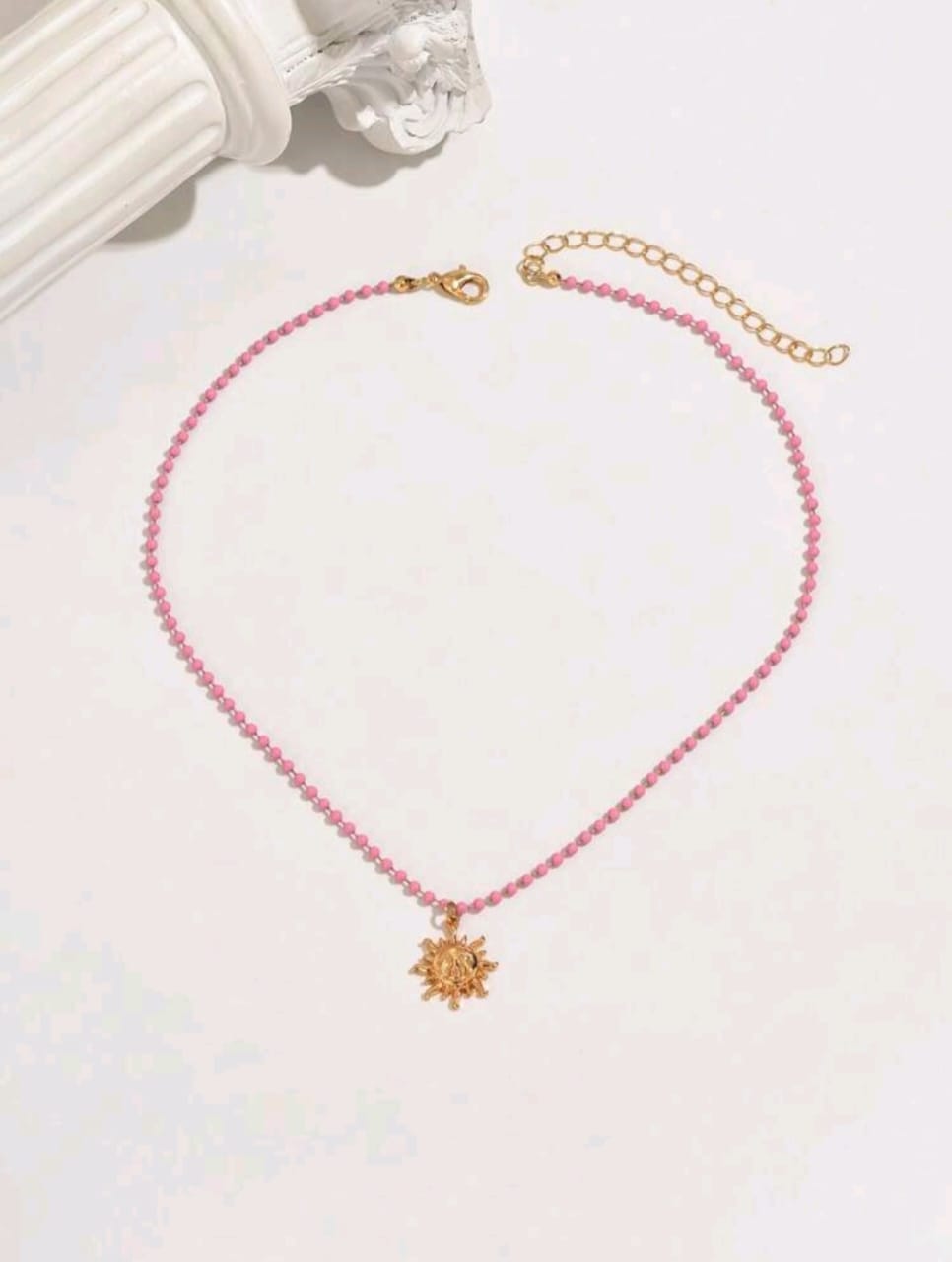 Layered charmed necklace