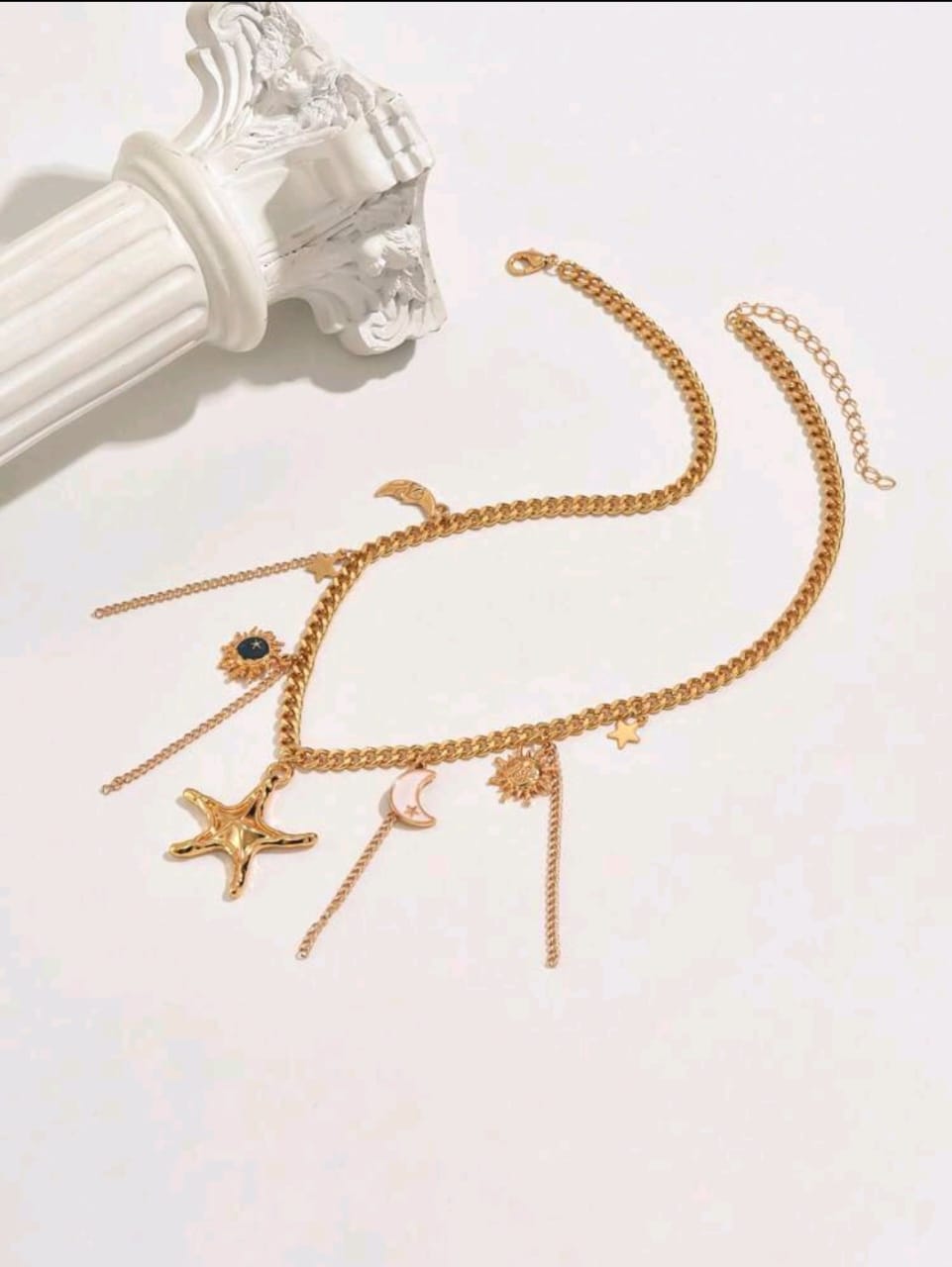 Layered charmed necklace