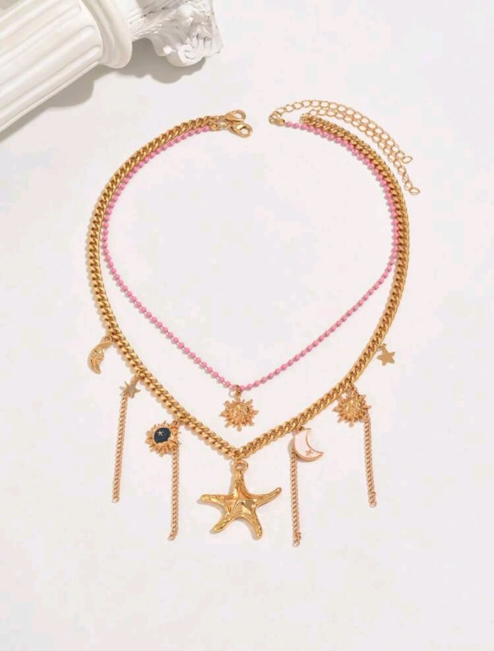 Layered charmed necklace