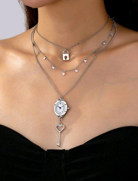 Triple layered silver clock necklace