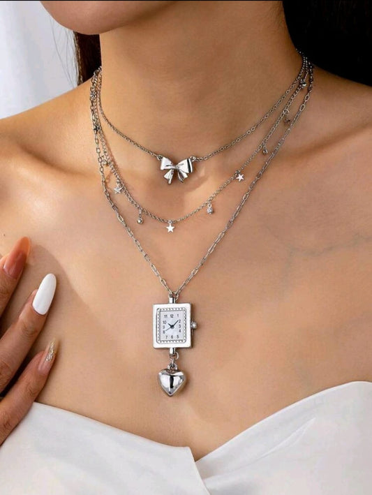 Triple layered silver clock necklace
