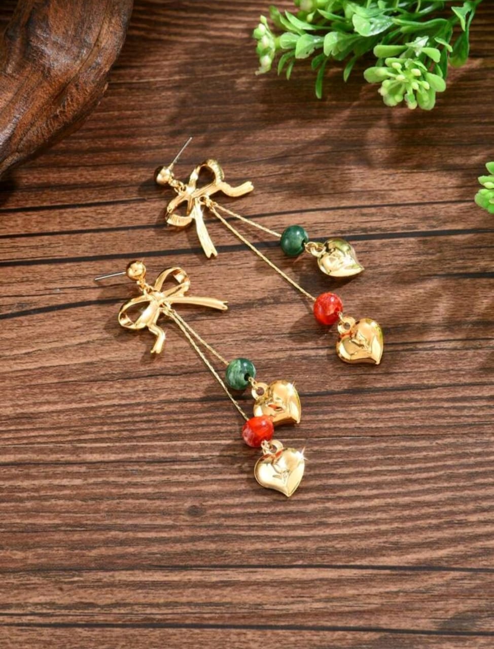 Bow detail earrings with charms
