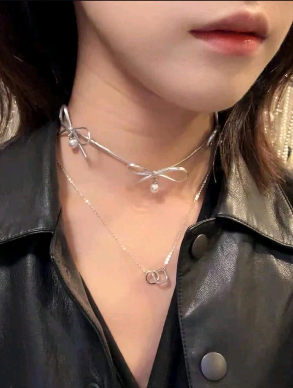 Silver bow and pearl detail necklace