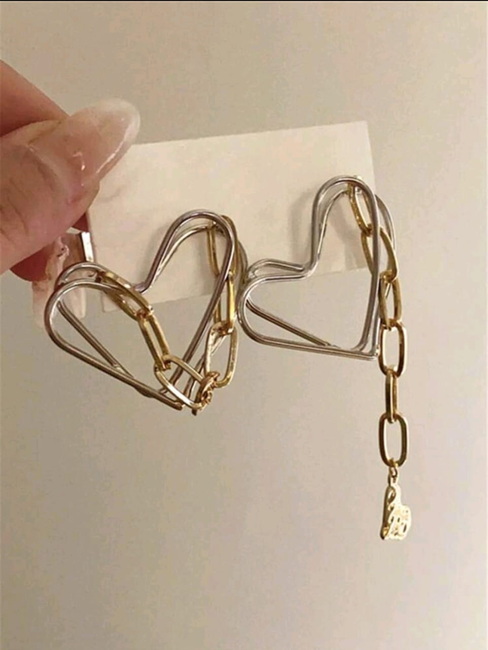 Heart silver and golden asymmetrical earrings