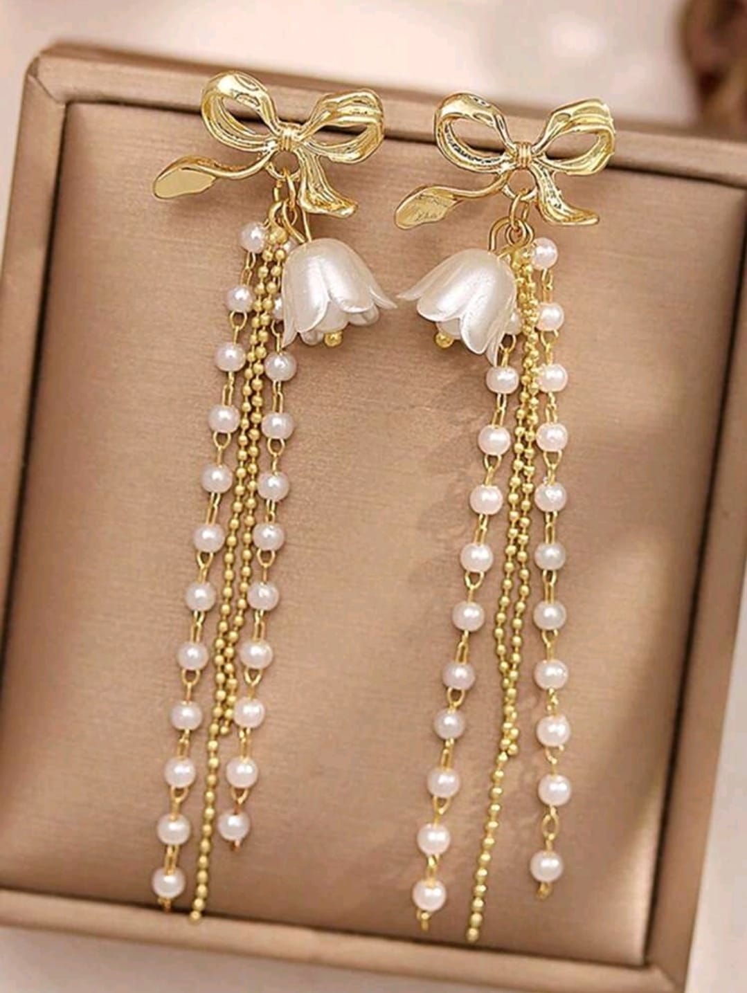 Bow detail pearl earrings
