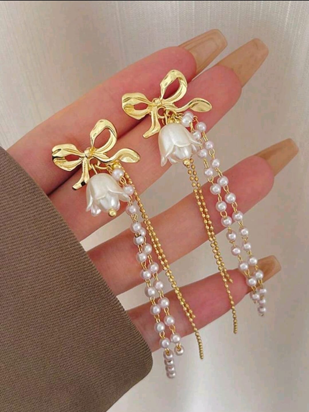 Bow detail pearl earrings