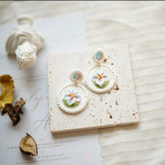 White flower detail earrings