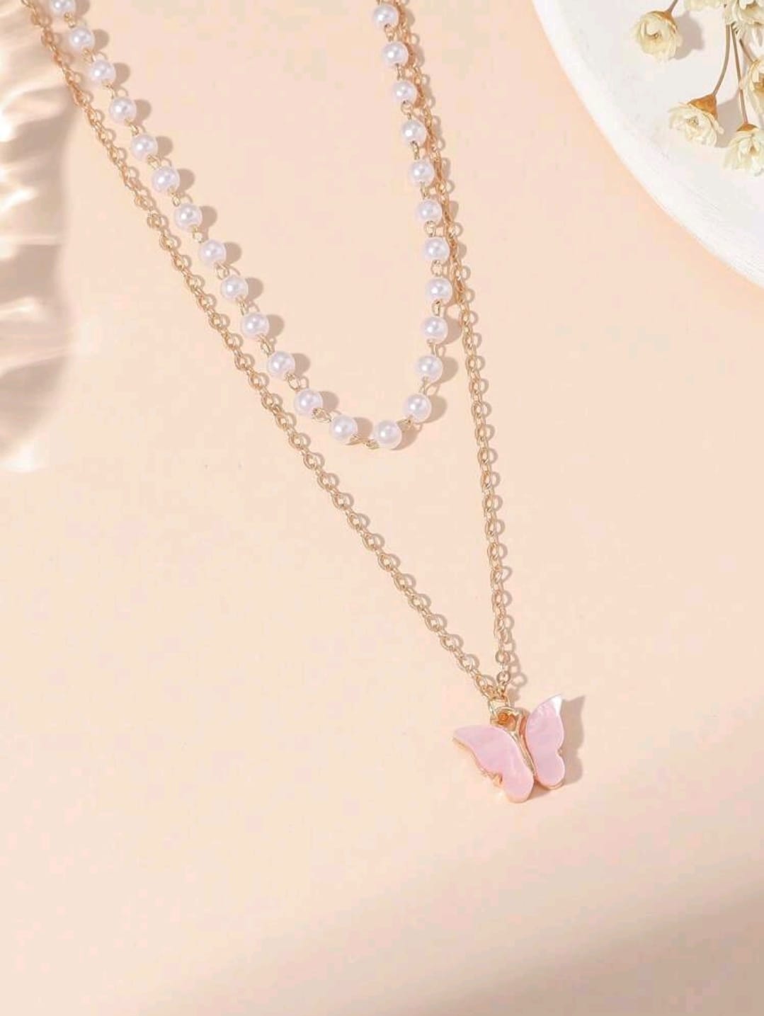 Layered pink butterfly necklace