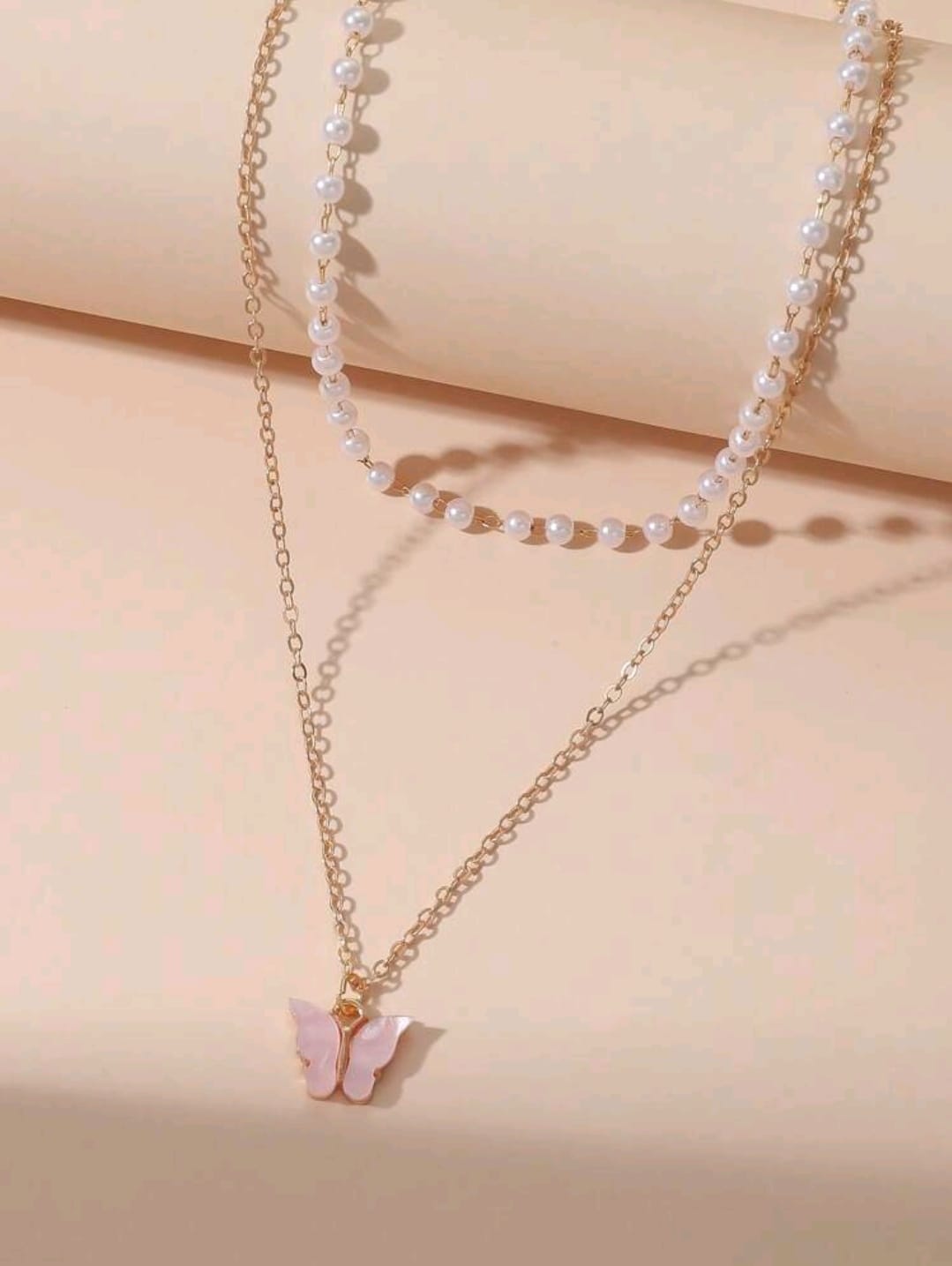 Layered pink butterfly necklace